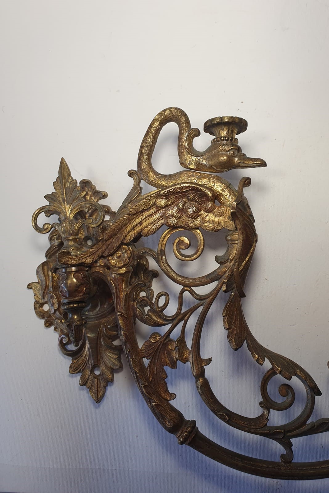 Coppia di appliques con cigni