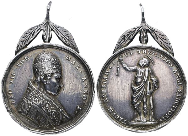 STATO PONTIFICIO. Leone XII (1823-1829). Medaglia 1824 per l'indizione dell'anno santo del 1825 Ag; 35gr; 43mm; Raro; BB, campi bulinati, con appiccagnolo d'epoca