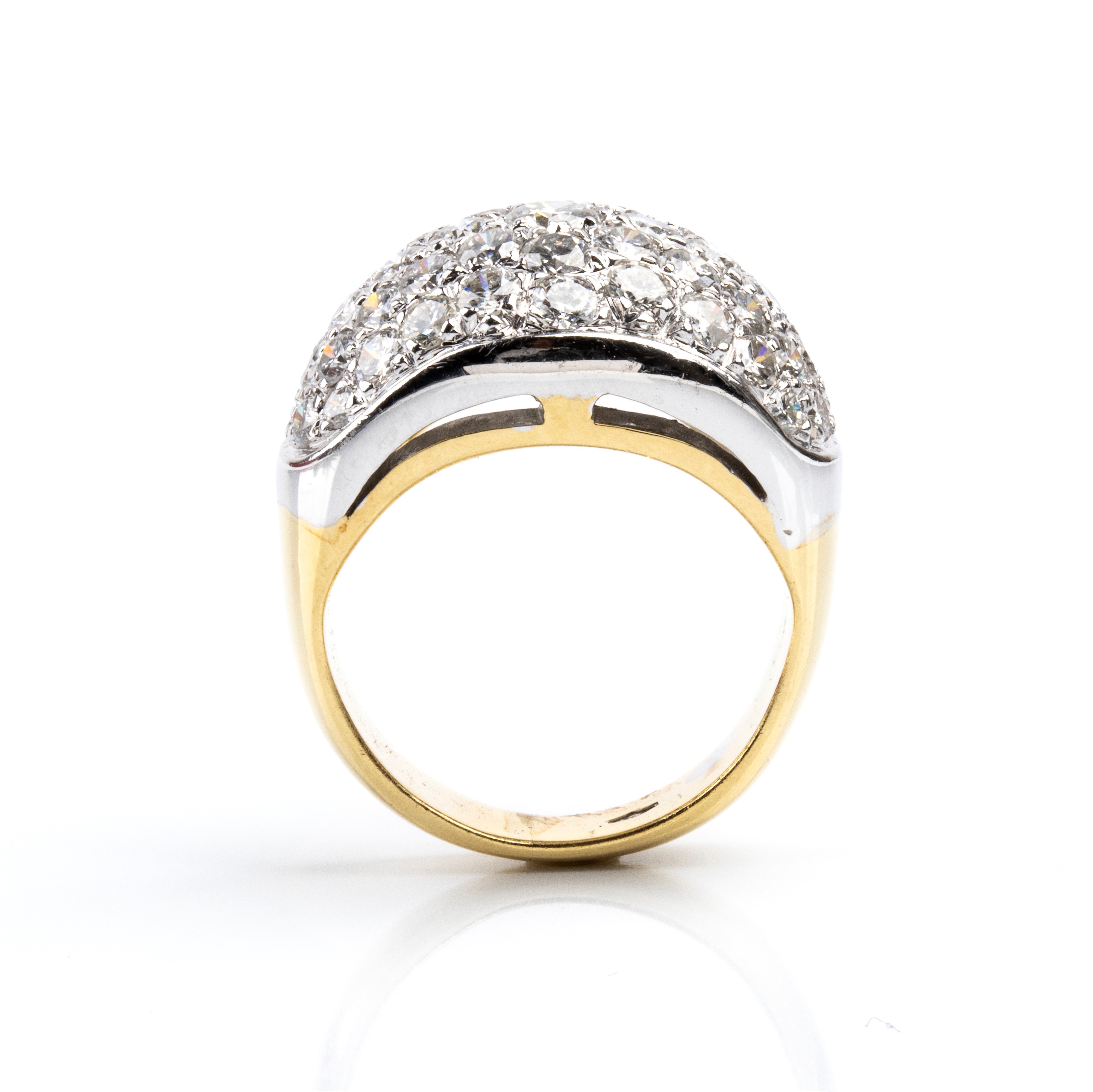 Anello a fascia in oro 18k con pavé di diamanti