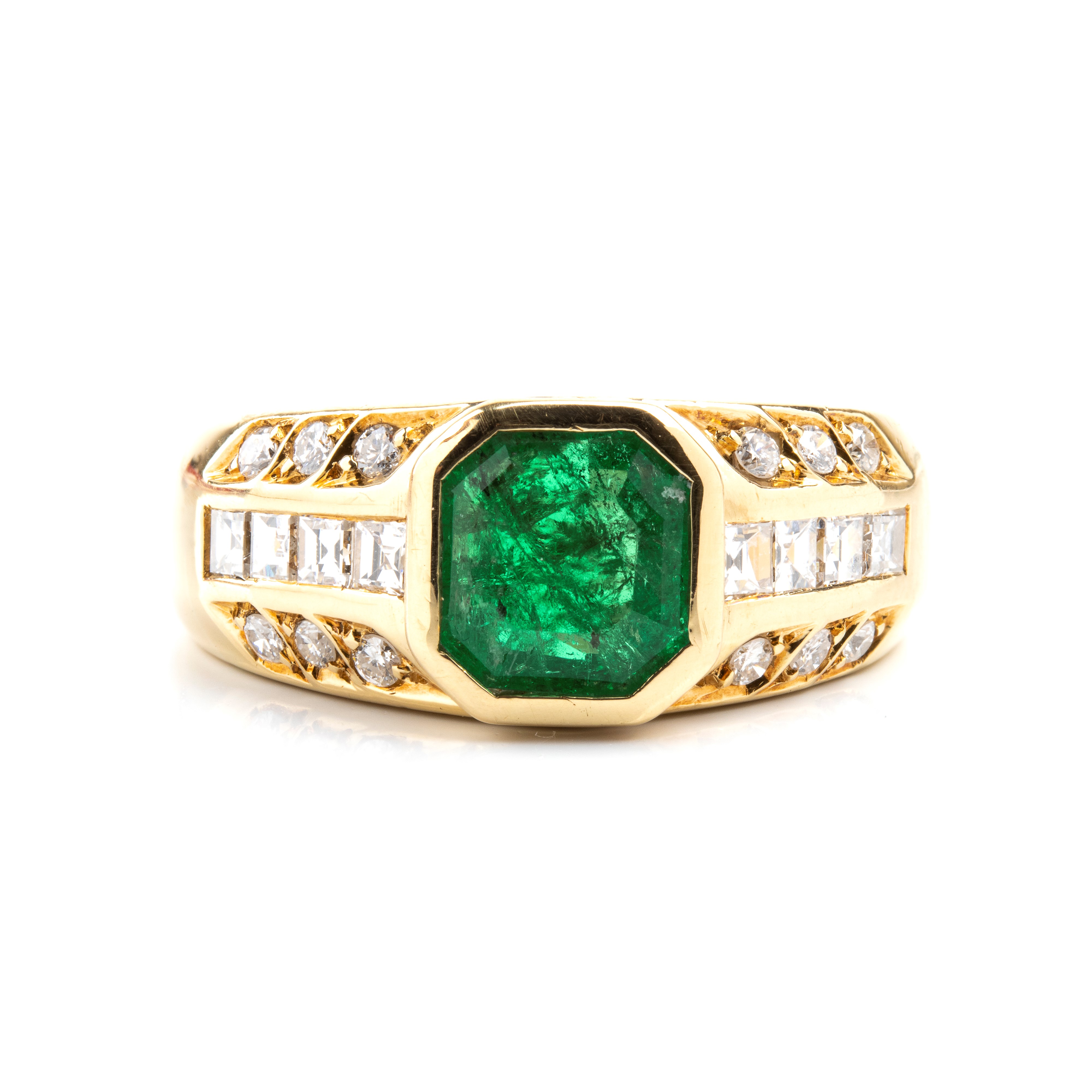 Anello in oro 18k con smeraldo e diamanti