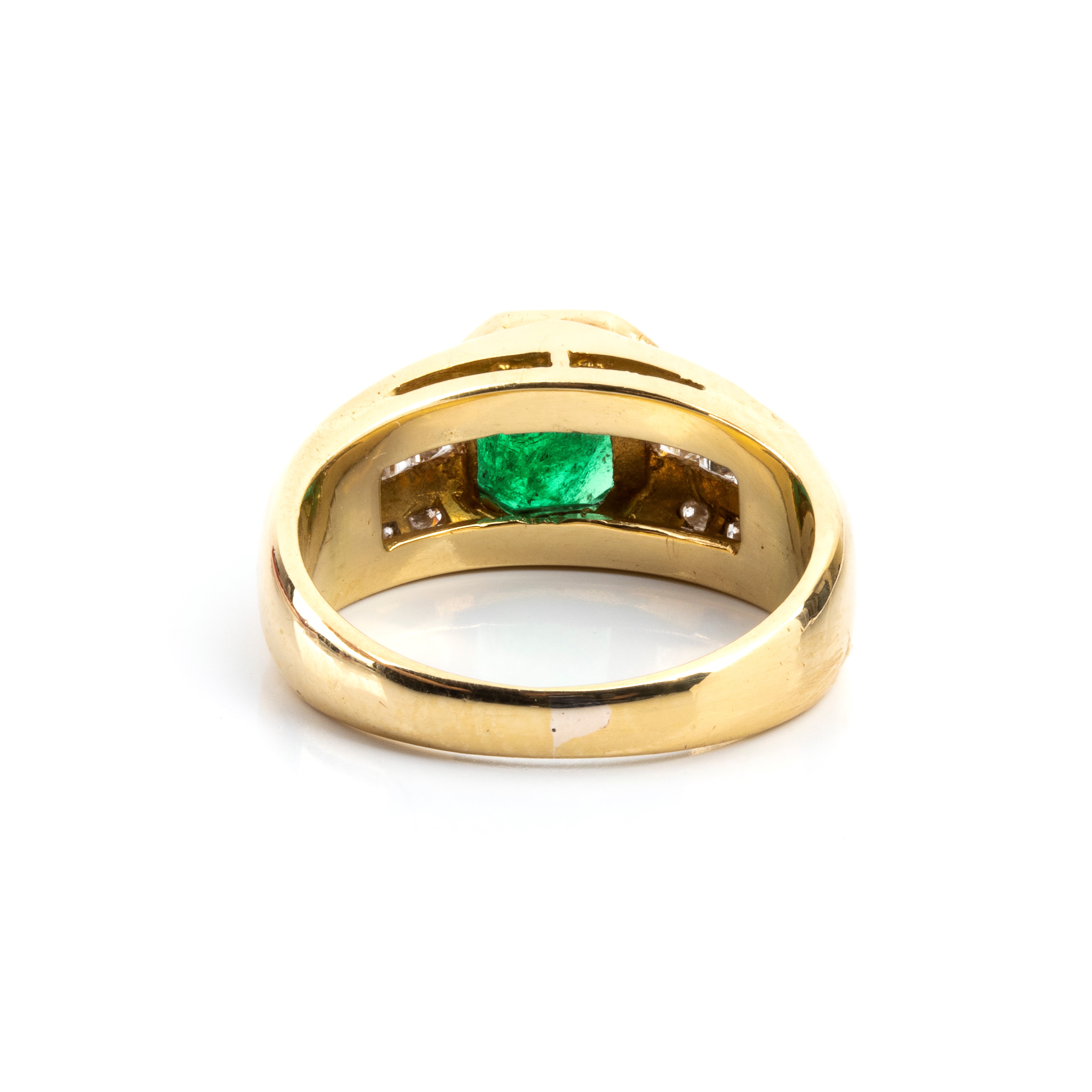 Anello in oro 18k con smeraldo e diamanti