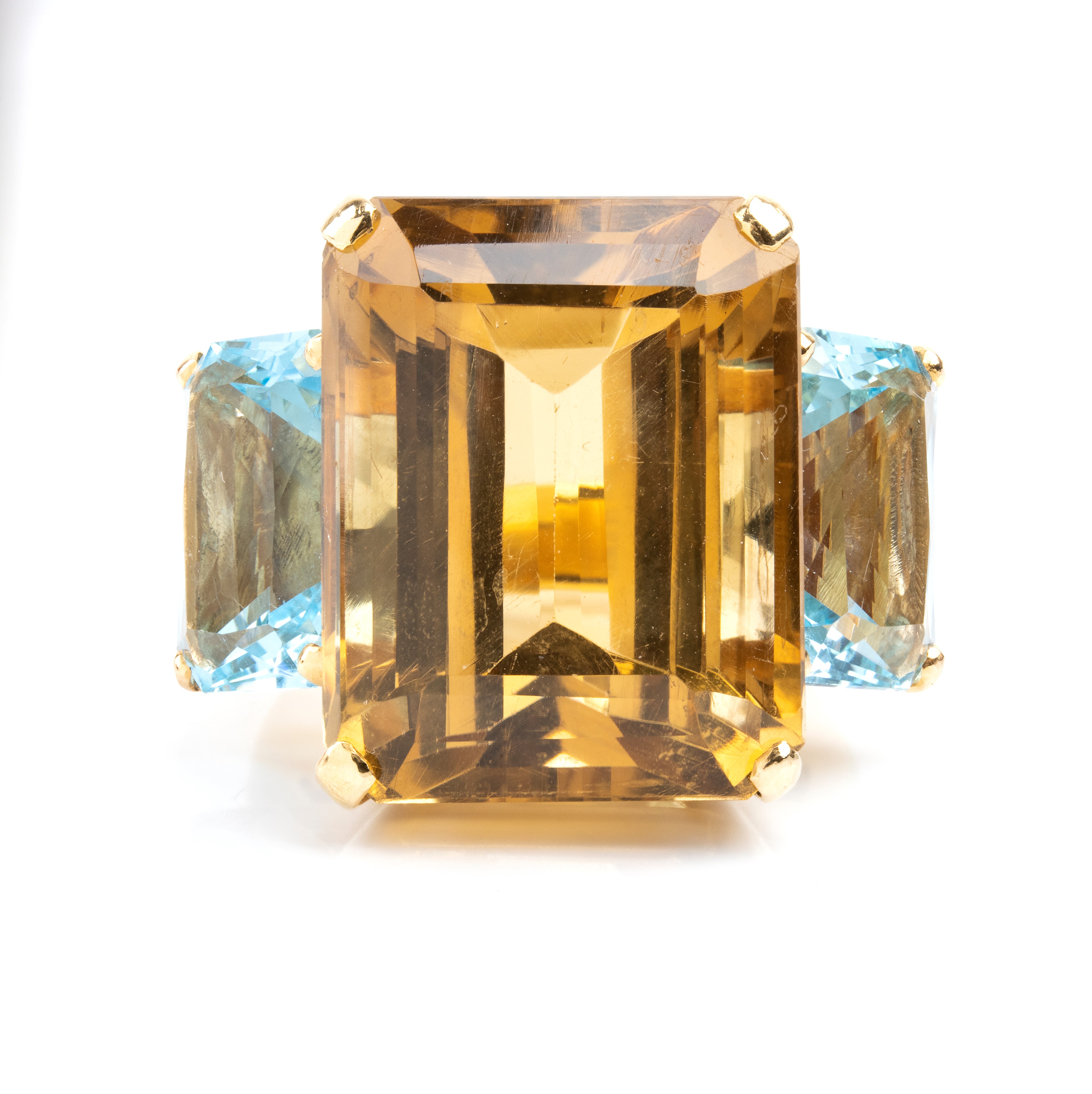 Anello a fascia in oro 18k con quarzo fumé e coppia di topazi azzurri