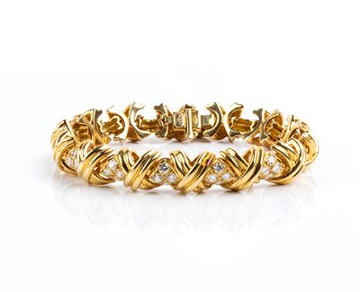Bracciale in oro giallo 18 kt con diamanti, motivo geometrico intrecciato
