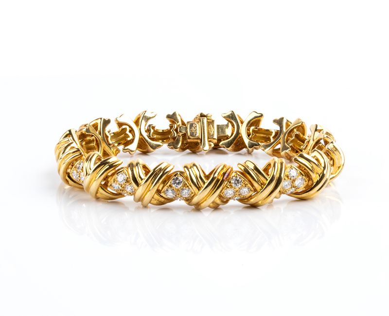 Tiffany & Co.® - Bracciale in oro giallo 18 kt con diamanti, motivo geometrico intrecciato