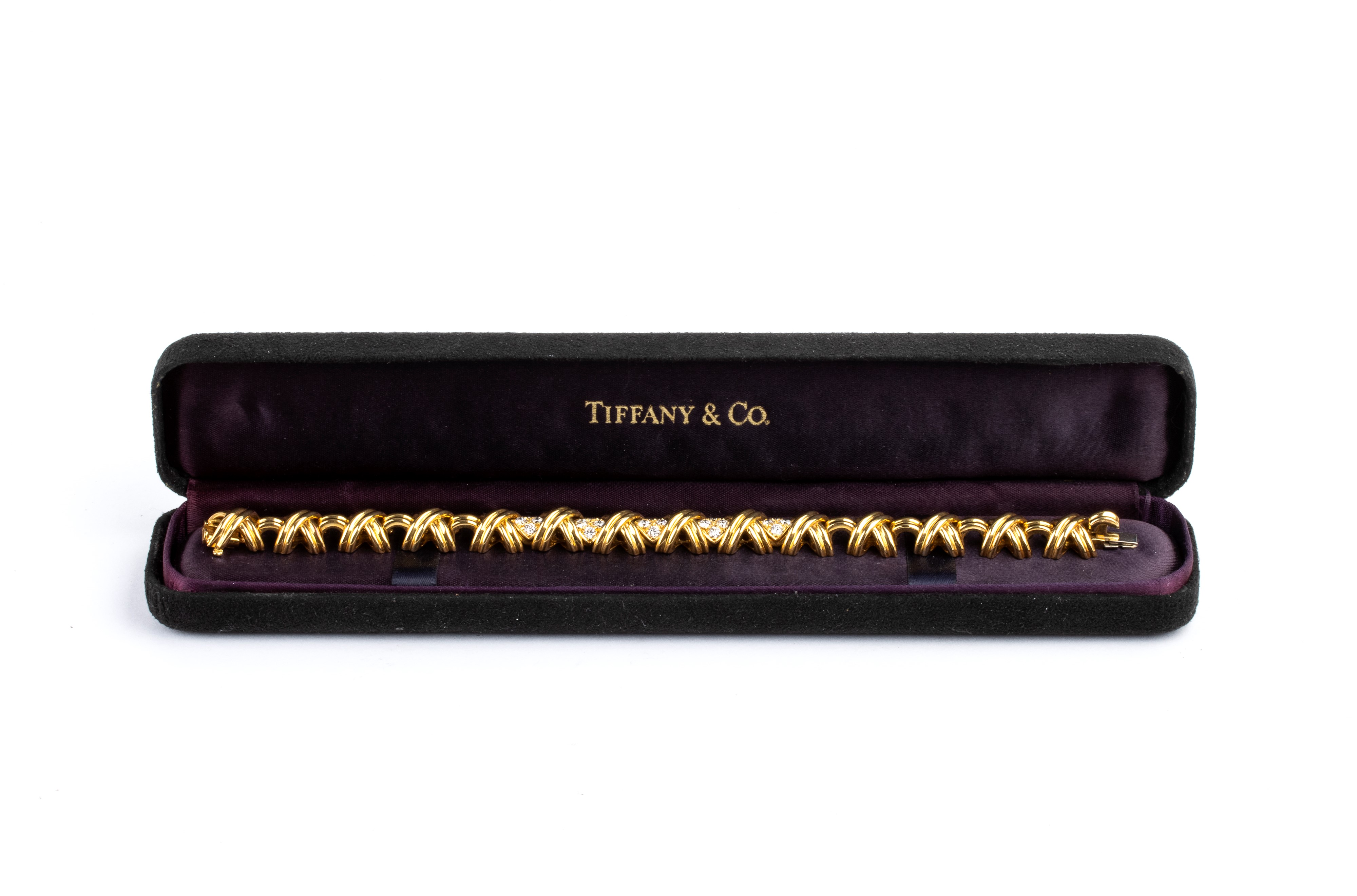 Tiffany & Co.® - Bracciale in oro giallo 18 kt con diamanti, motivo geometrico intrecciato
