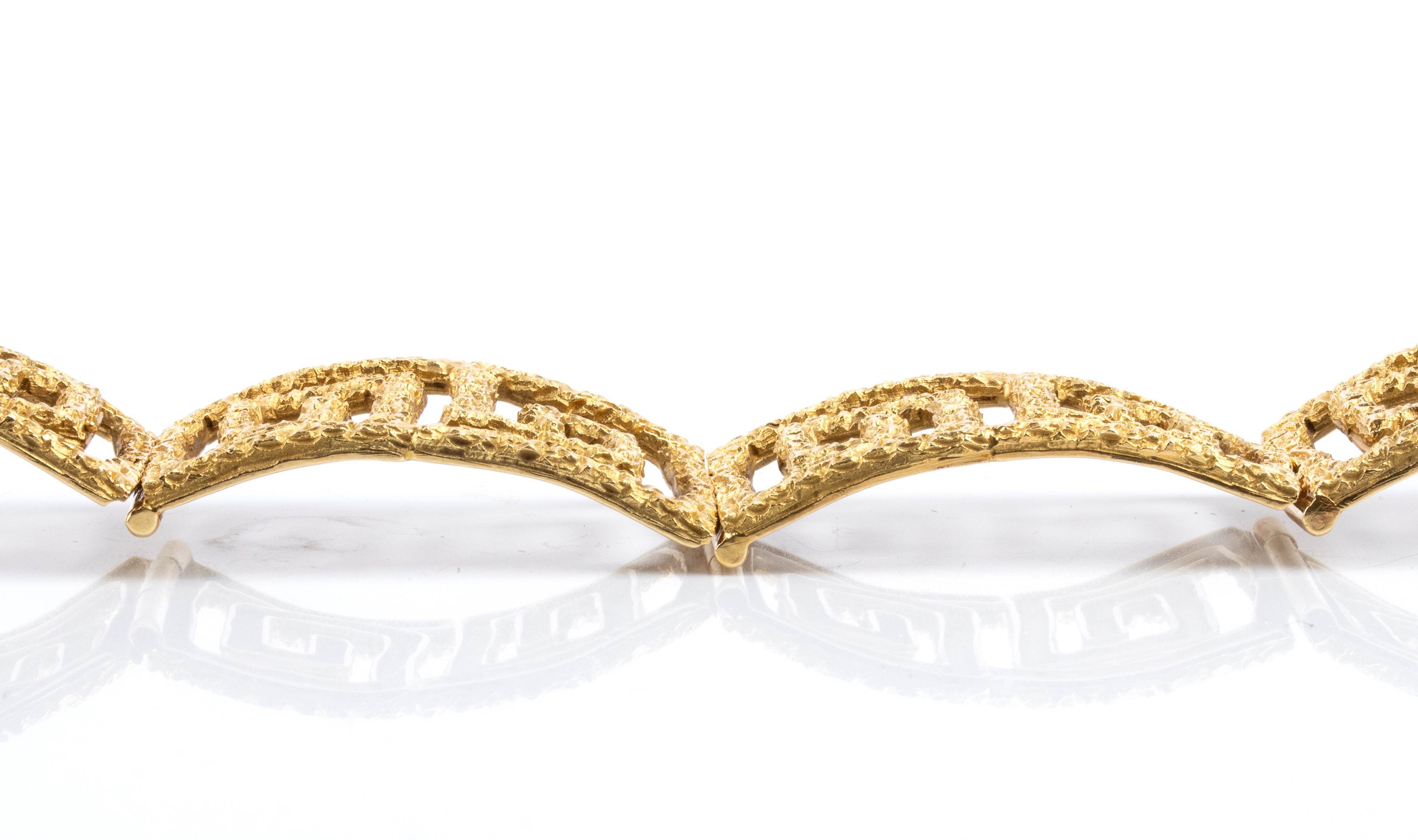 Bracciale in oro giallo 18k a spirali intrecciate, anni ’60