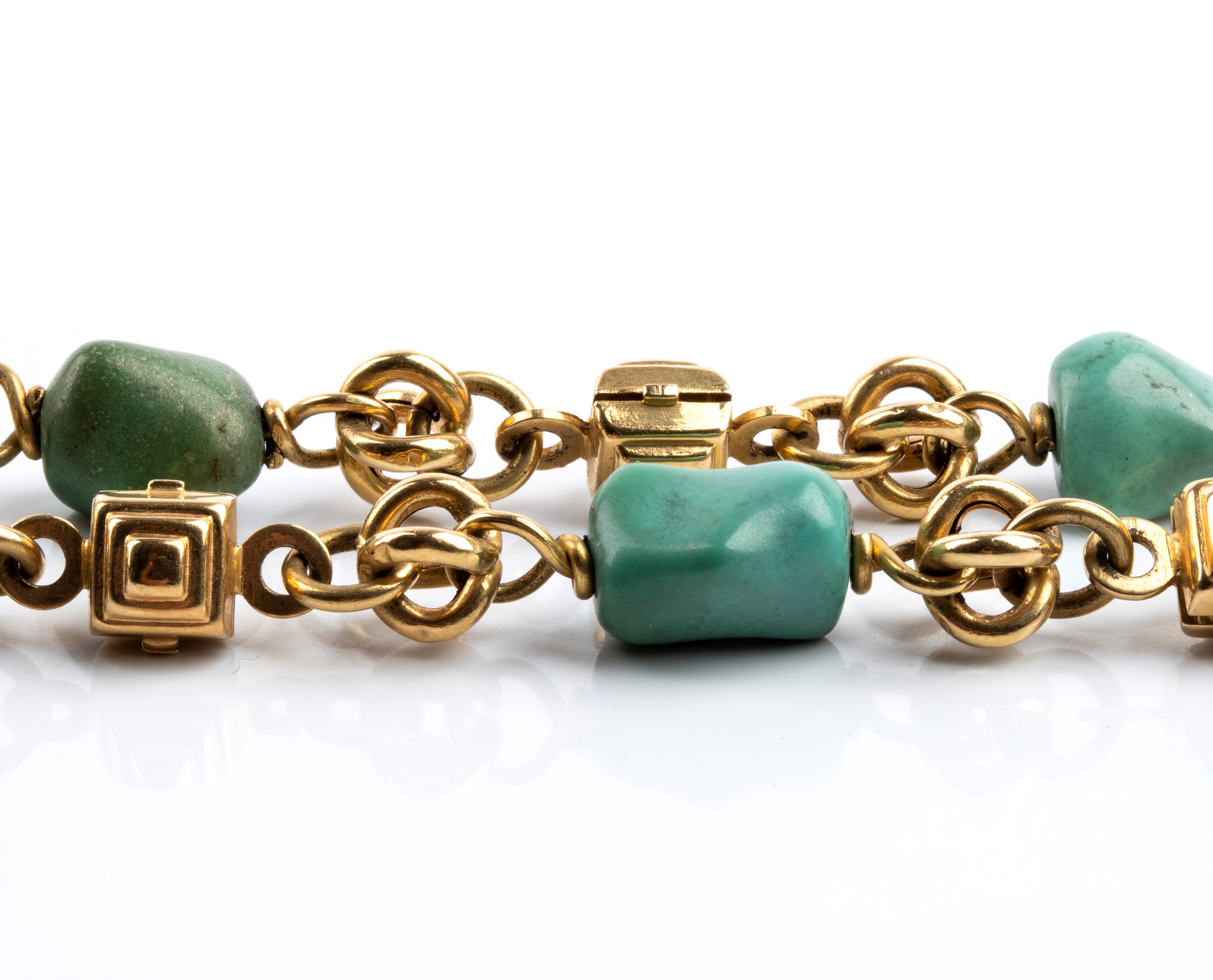 Parure in oro giallo 18k e turchesi (anni '80), Orecchini, anello e collana