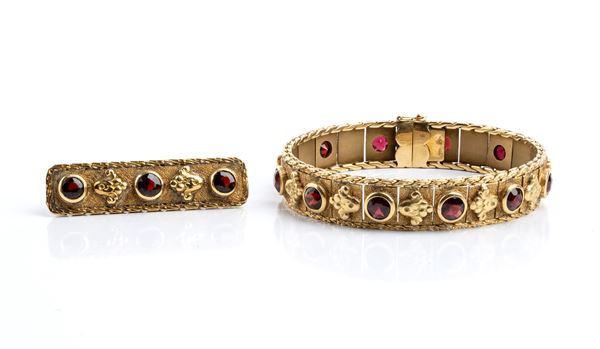 Bracciale e spilla in oro e granati