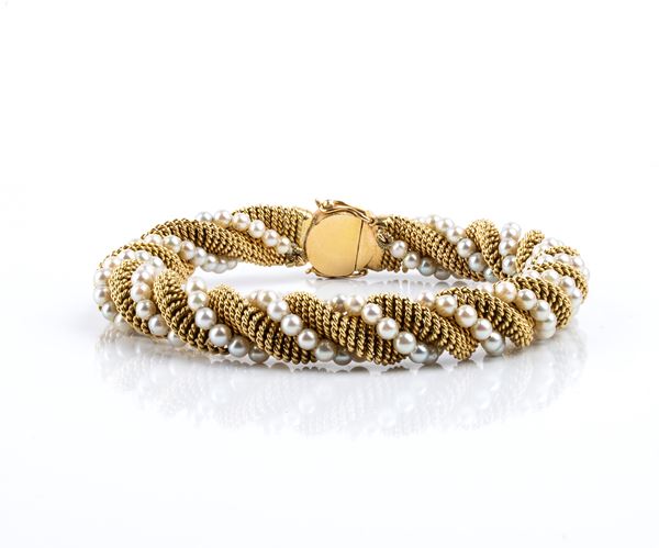 Bracciale con motivo a torsade in oro e perle 