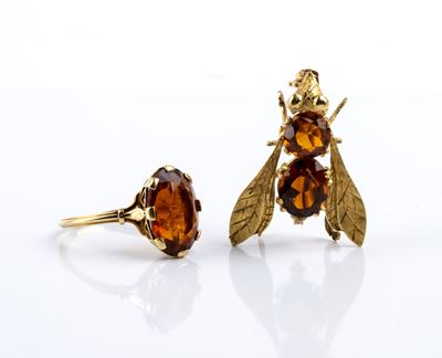 Spilla e anello in oro con quarzi citrini (punzonatura K18)