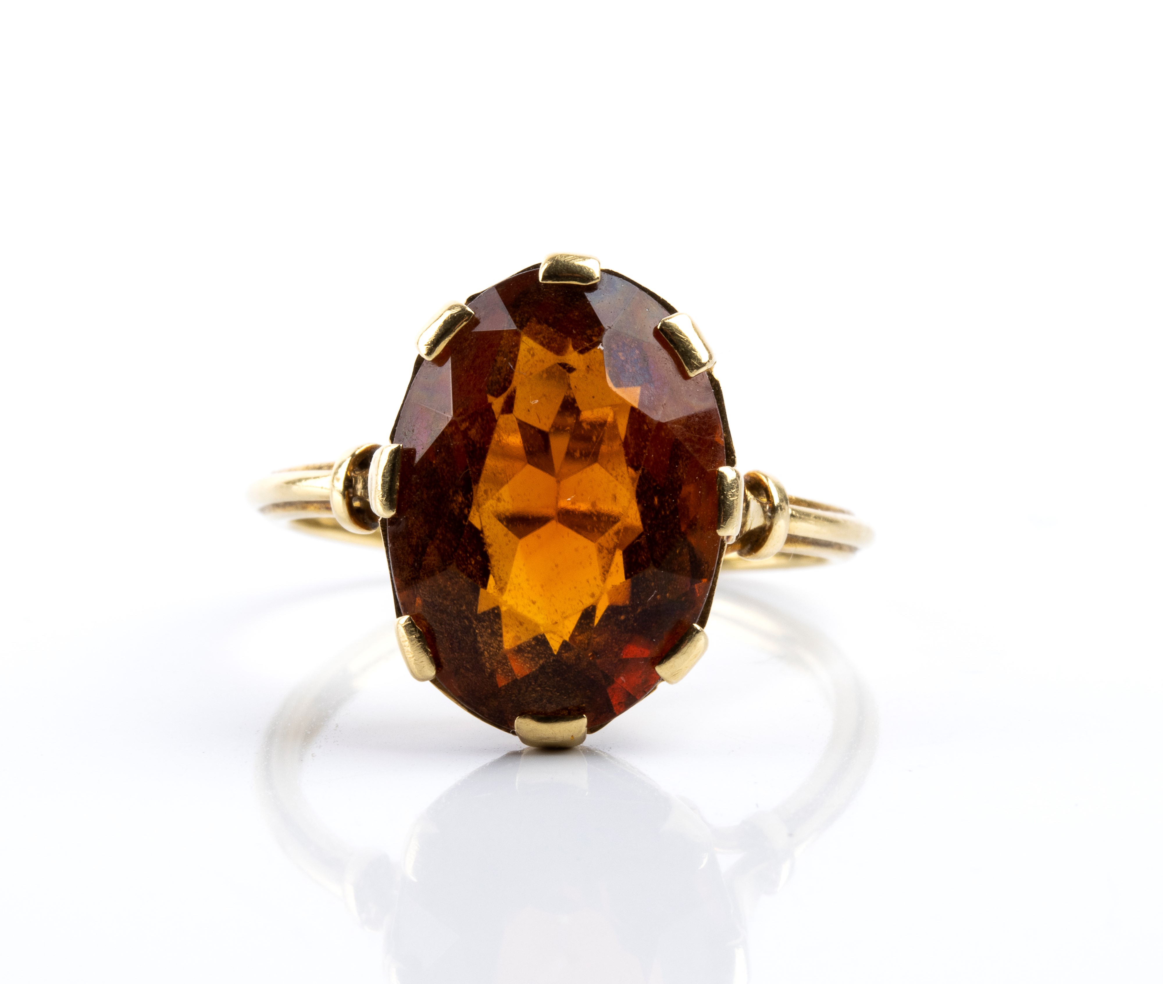 Spilla e anello in oro con quarzi citrini (punzonatura K18)
