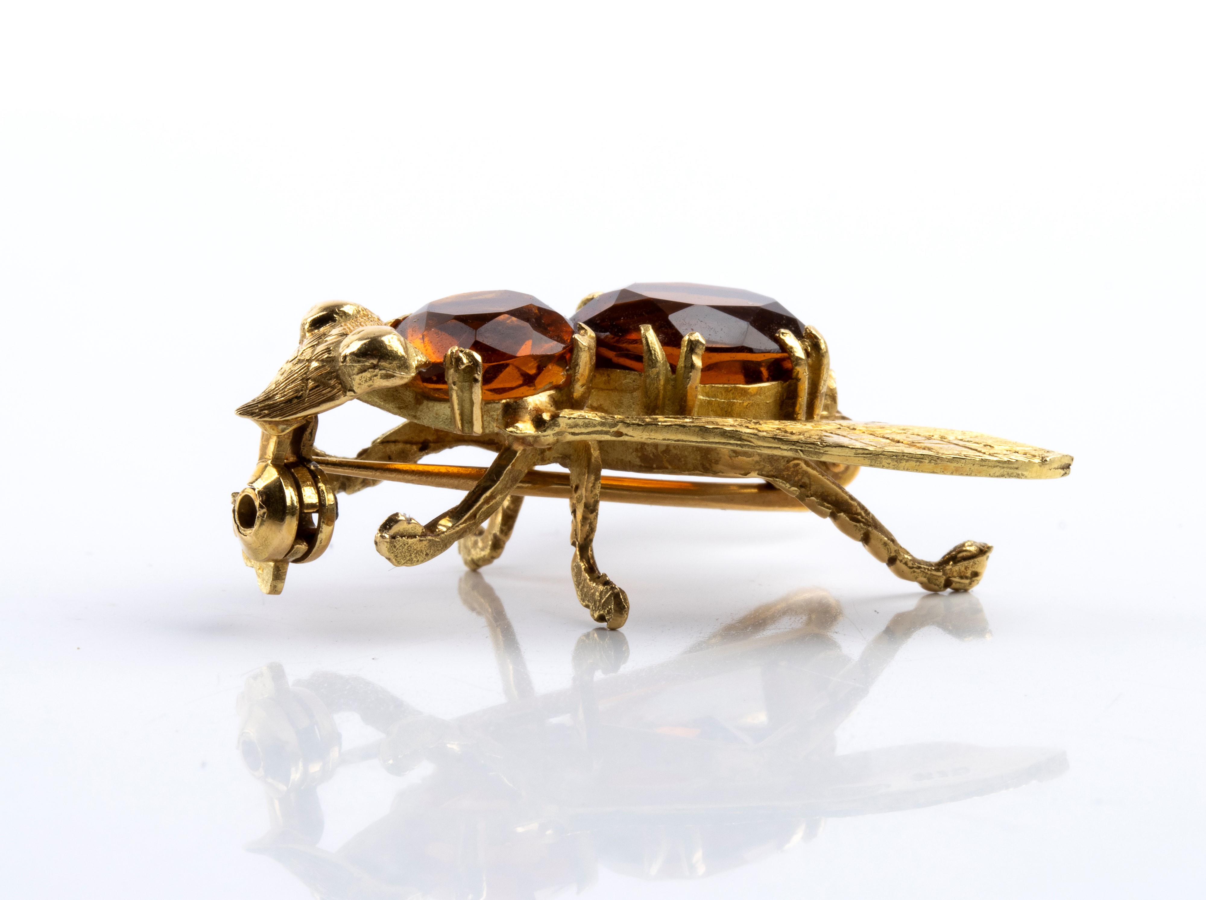 Spilla e anello in oro con quarzi citrini (punzonatura K18)
