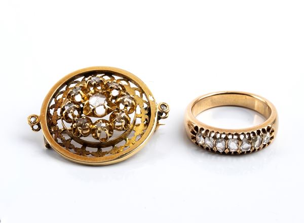 Spilla pendente ed anello in oro giallo e diamanti