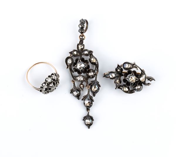 Gold, silver and diamond demi parure