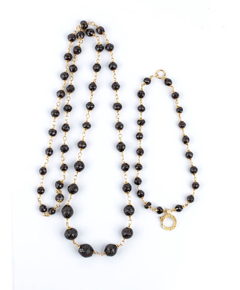 Bracciale e girocollo in oro giallo e pietre quarzo, con rondelle sfaccettate