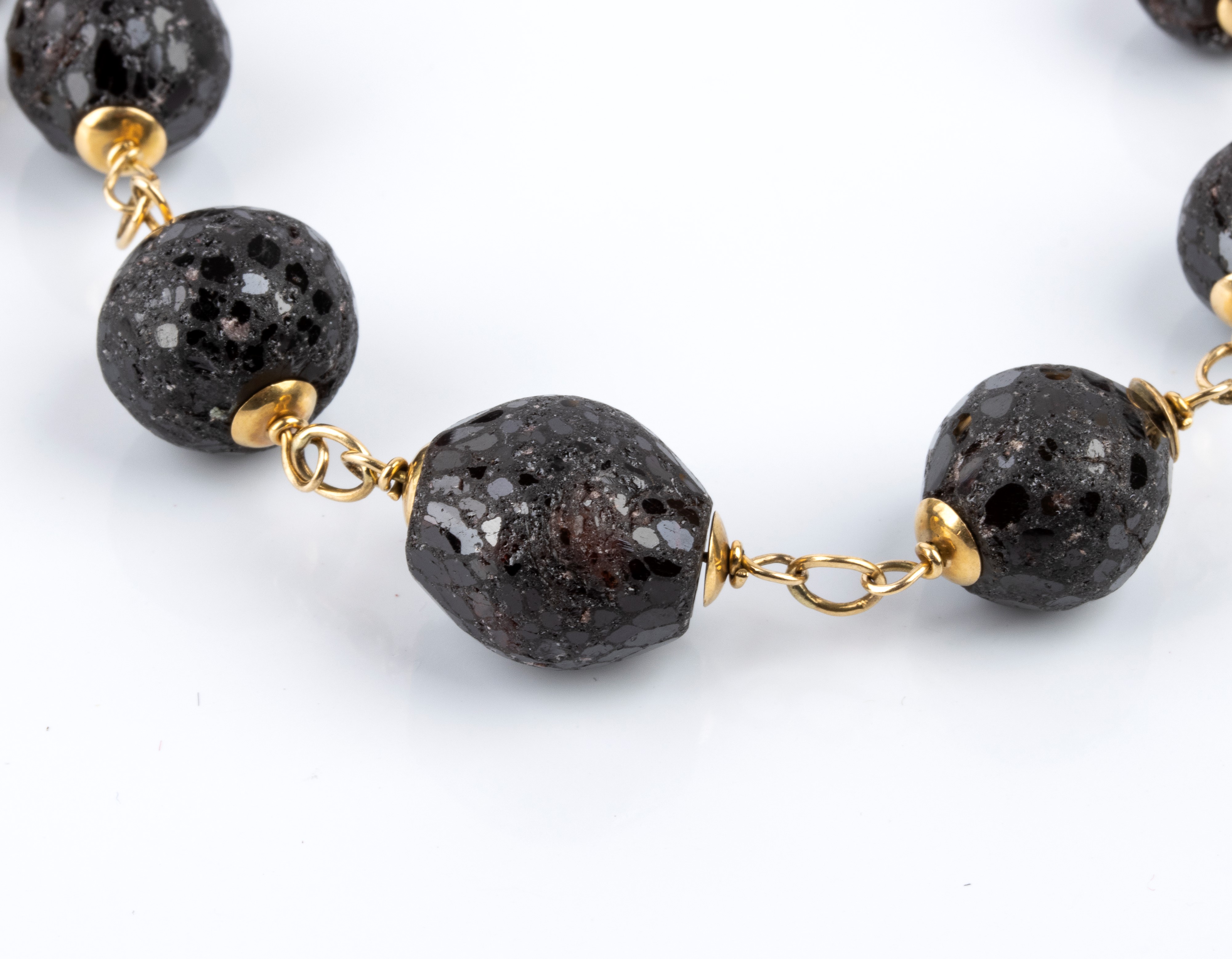 Bracciale e girocollo in oro giallo e pietre quarzo, con rondelle sfaccettate