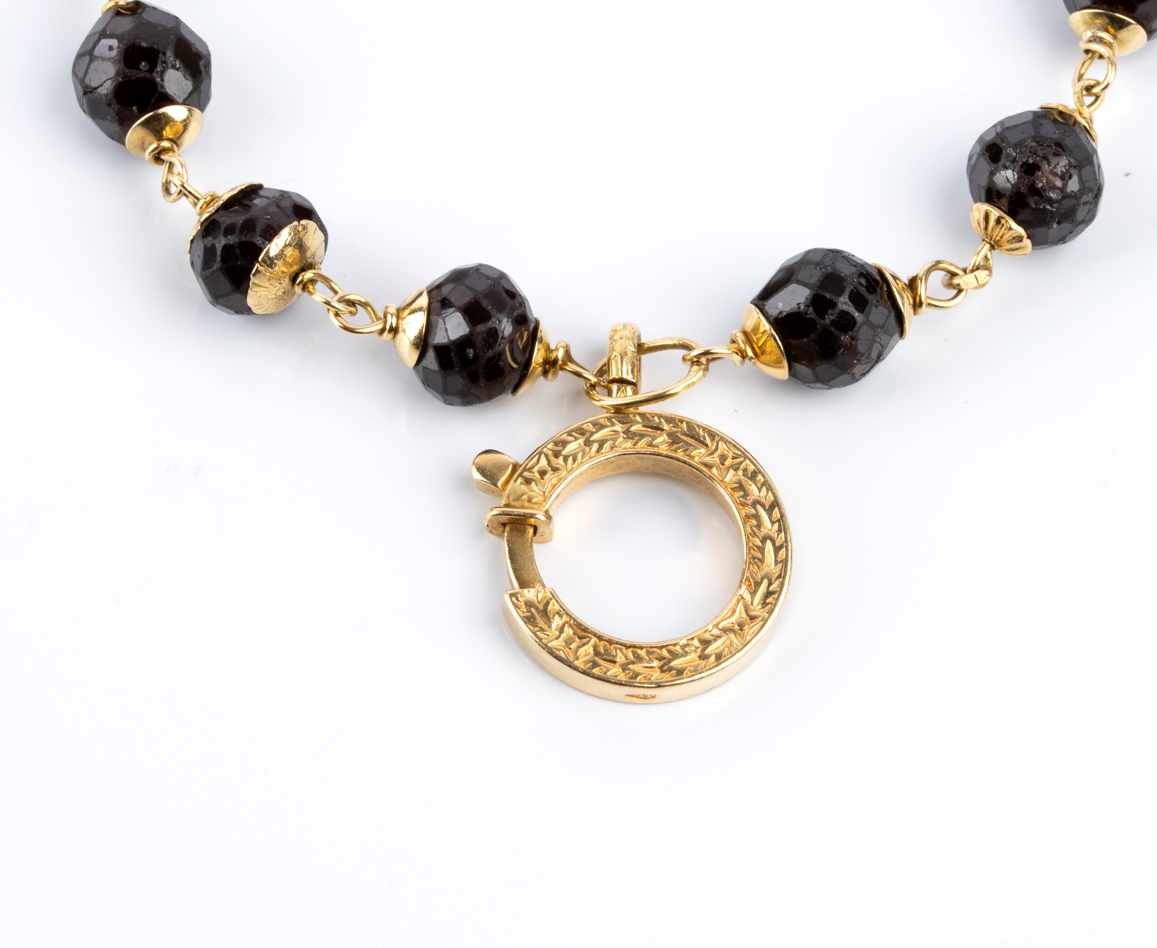 Bracciale e girocollo in oro giallo e pietre quarzo, con rondelle sfaccettate