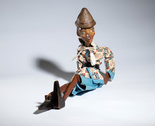 Pinocchio, burattino in legno e cartapesta