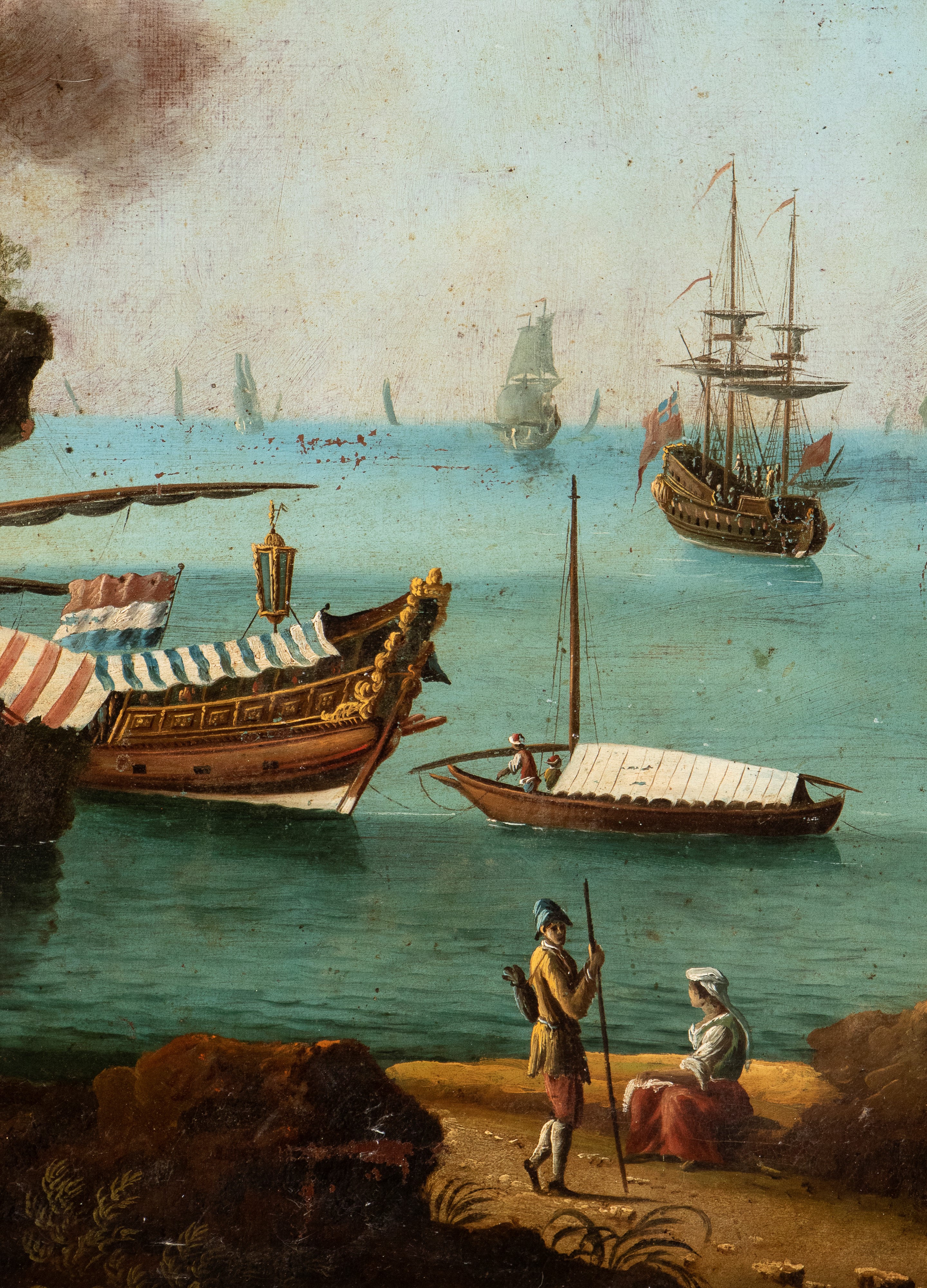 Veduta costiera con arco di roccia, figure e imbarcazioni