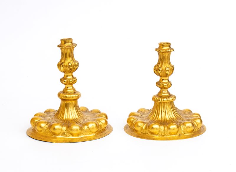 Coppia candelieri tedeschi in metallo dorato