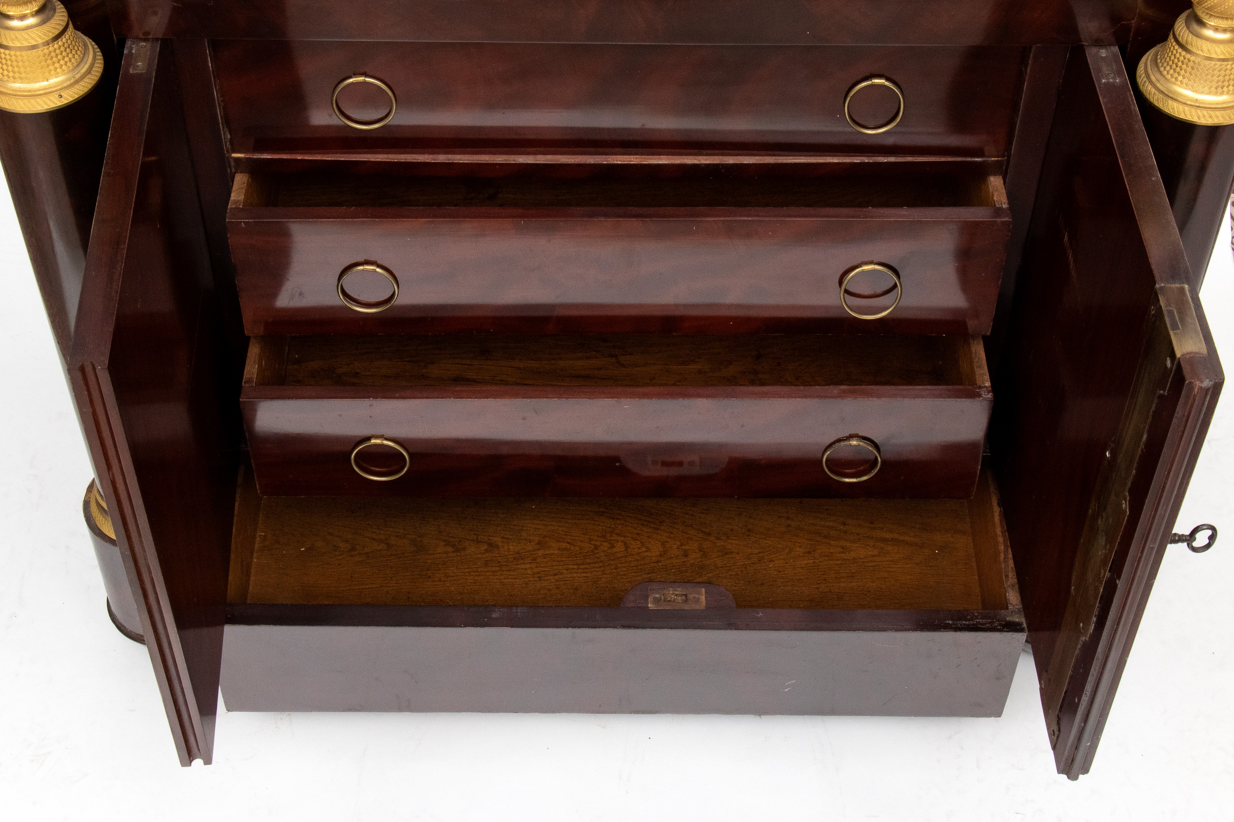 Secretaire Impero francese, mogano fiammato con bronzi dorati, ribalta e piano in marmo nero d’Af...