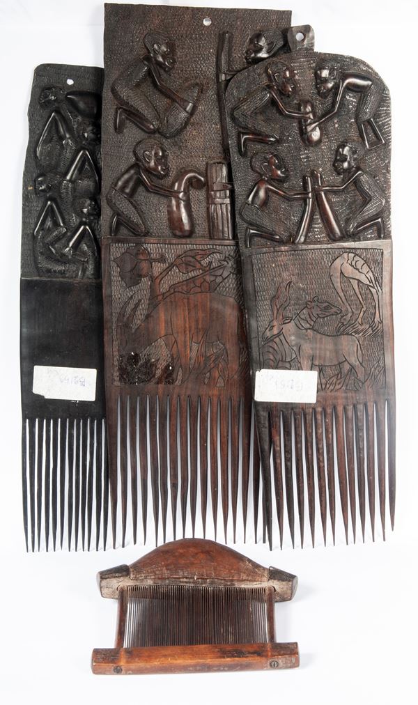 Lot of four wooden combs of different shapes and sizes