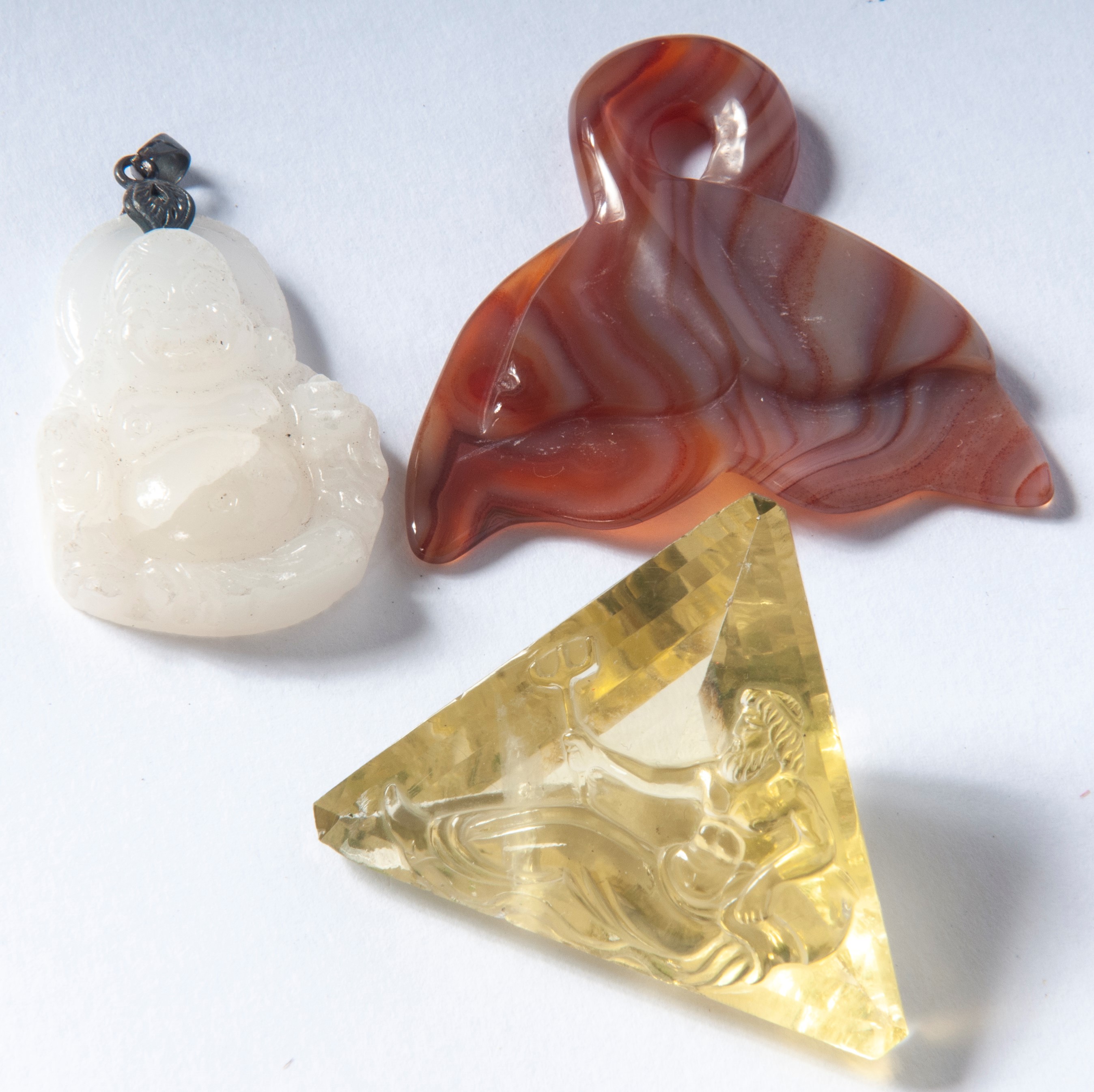 Gruppo di sette sculture in materiale lapideo con quarzo fumè, XX secolo