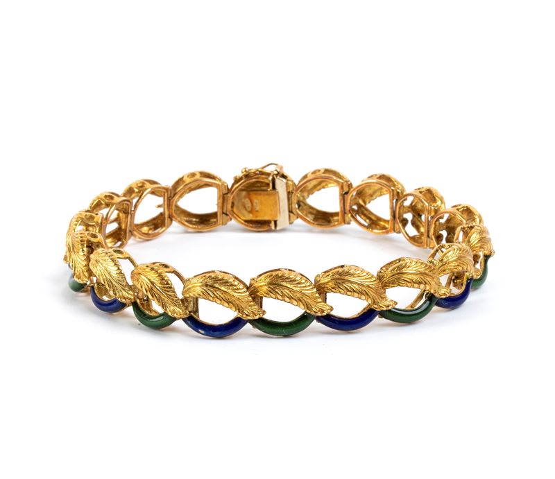 Bracciale in oro giallo 18k e smalti, maglie ad anello con motivo a foglie