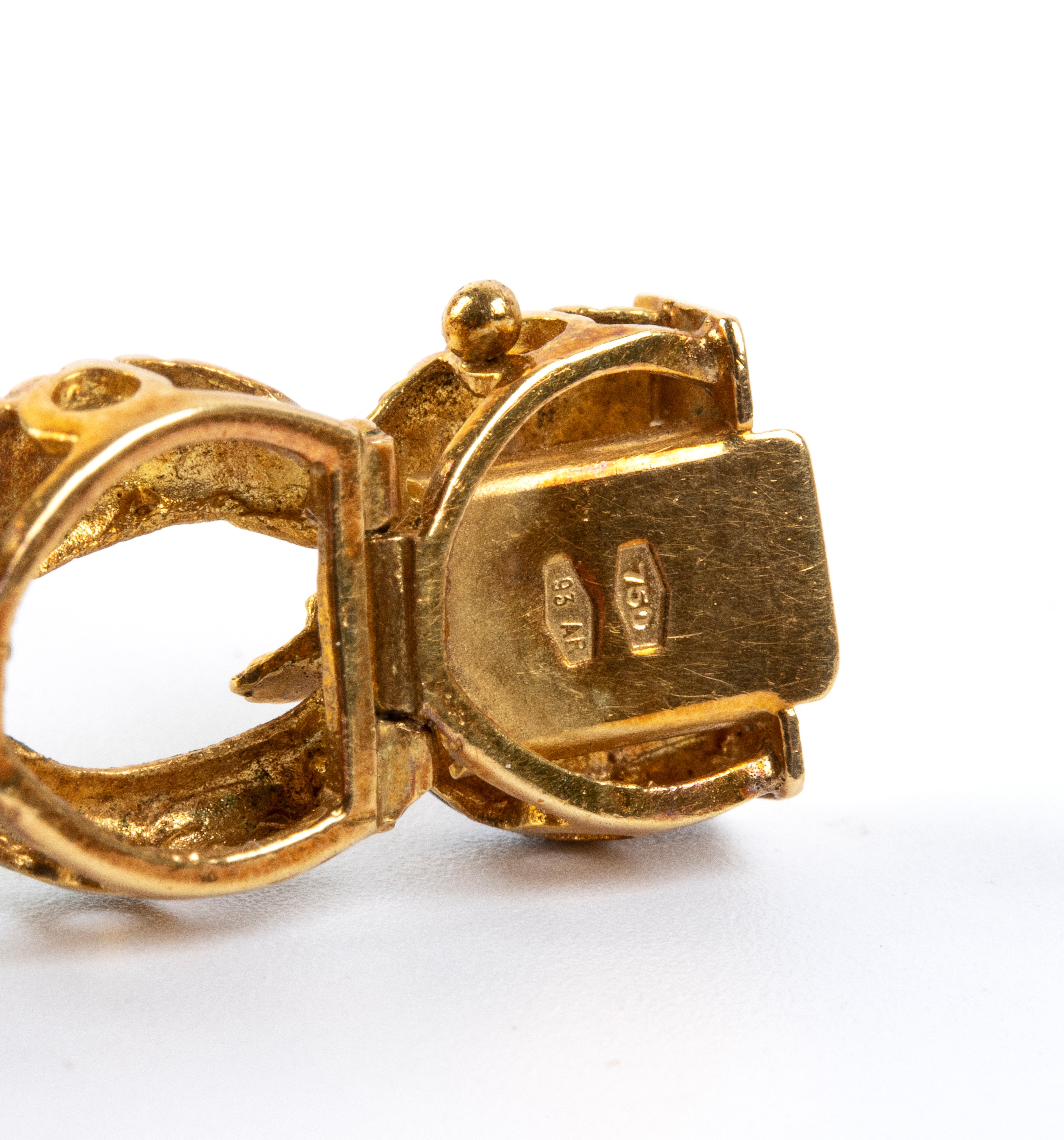 Bracciale in oro giallo 18k e smalti, maglie ad anello con motivo a foglie