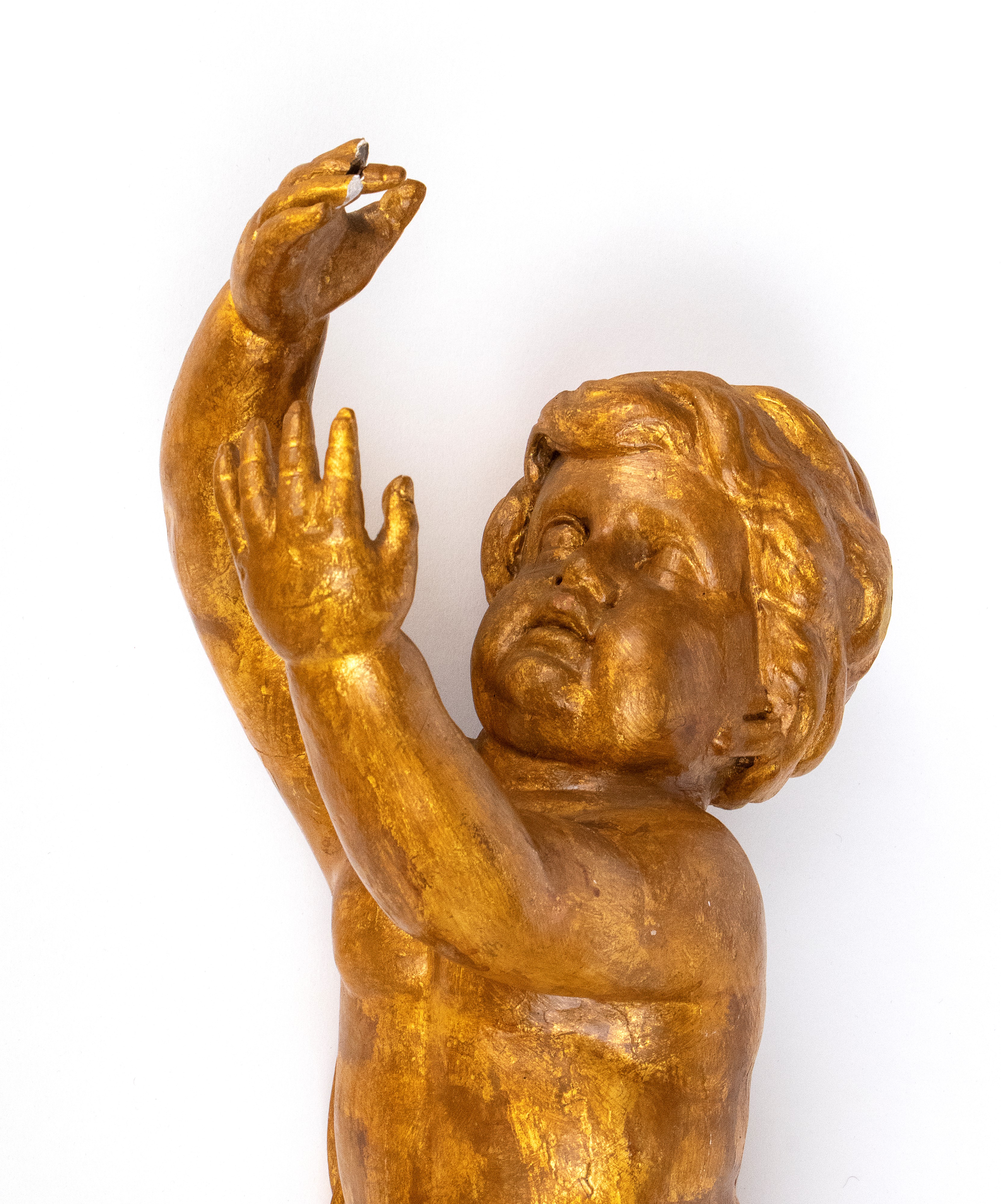 Coppia di putti dorati italiani, XVIII secolo, legno dorato