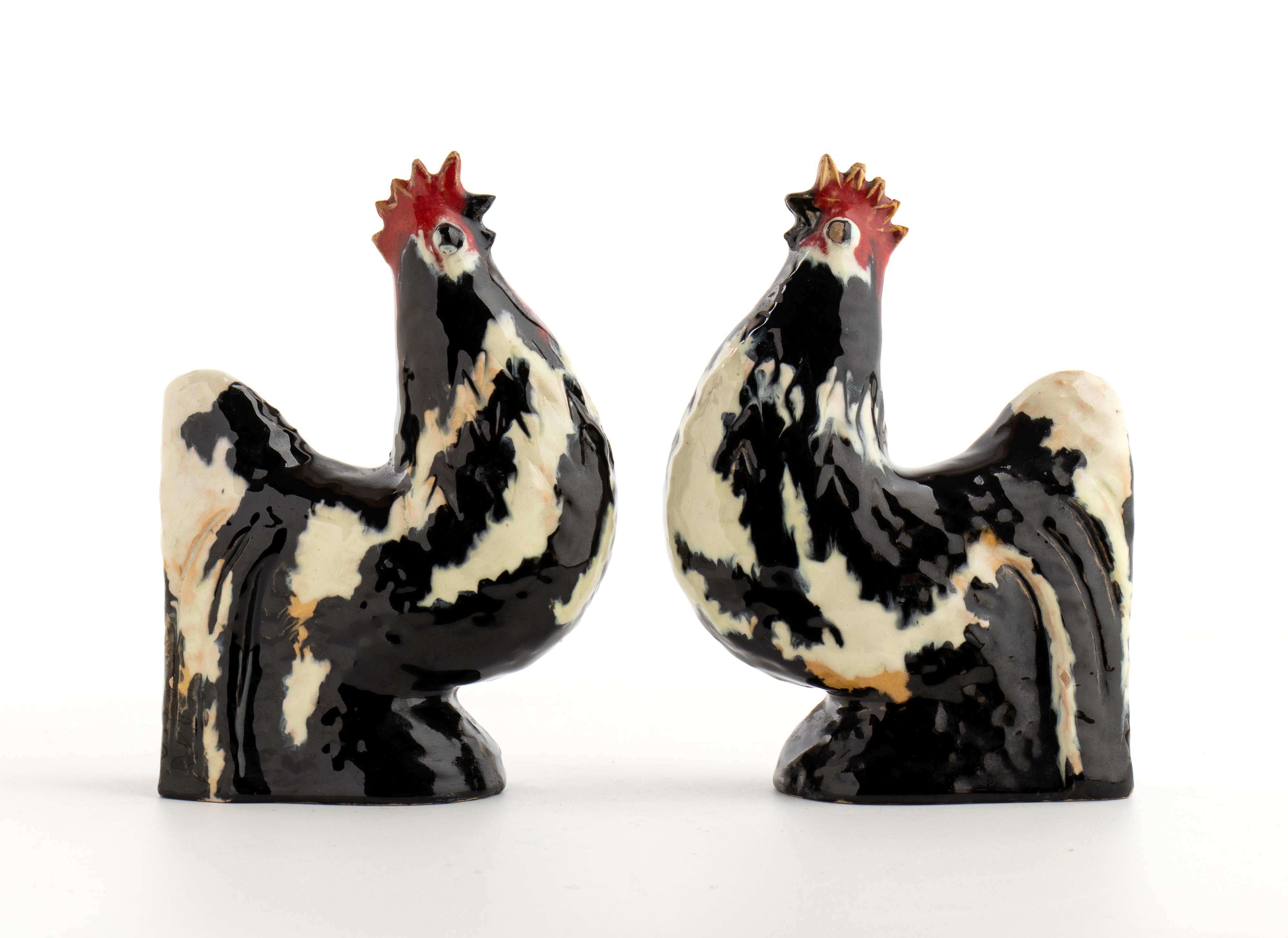 Coppia di ceramiche reggilibro