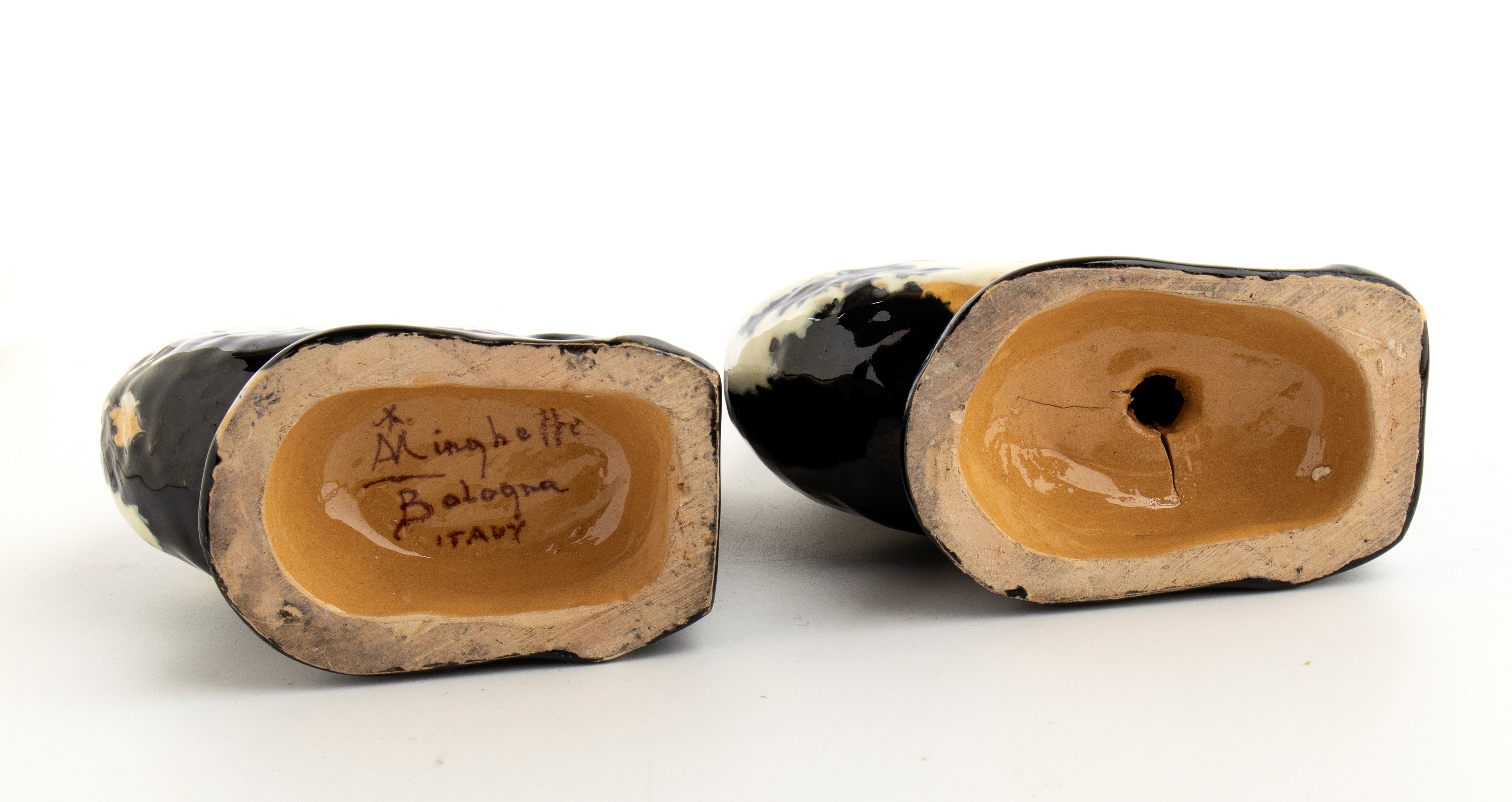 Coppia di ceramiche reggilibro