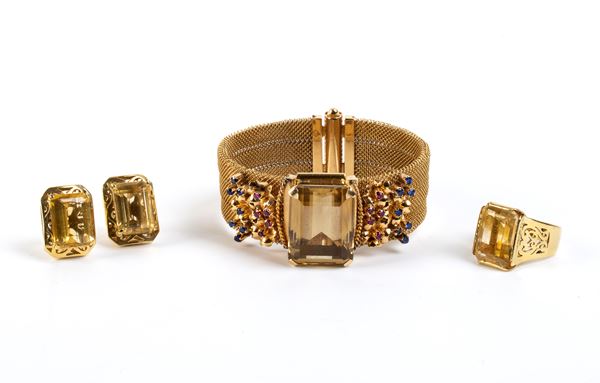 Parure in oro e pietre