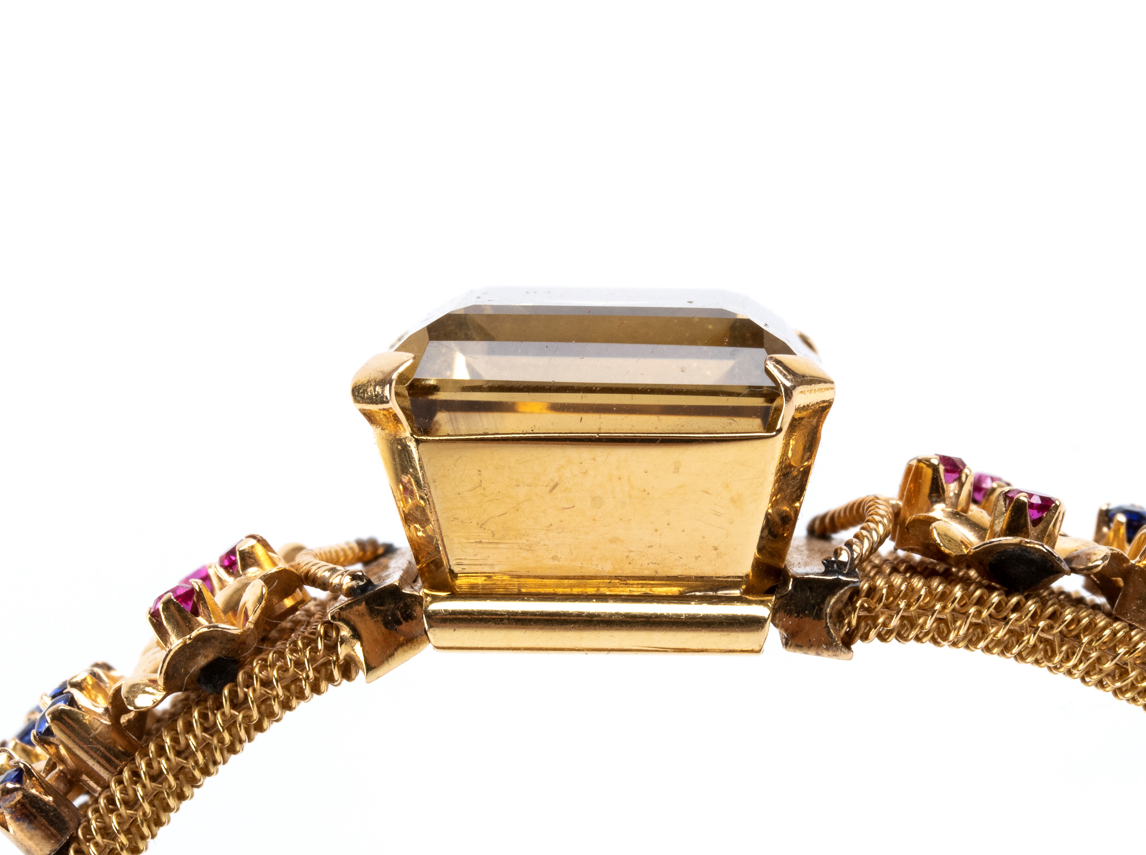 Parure in oro e pietre