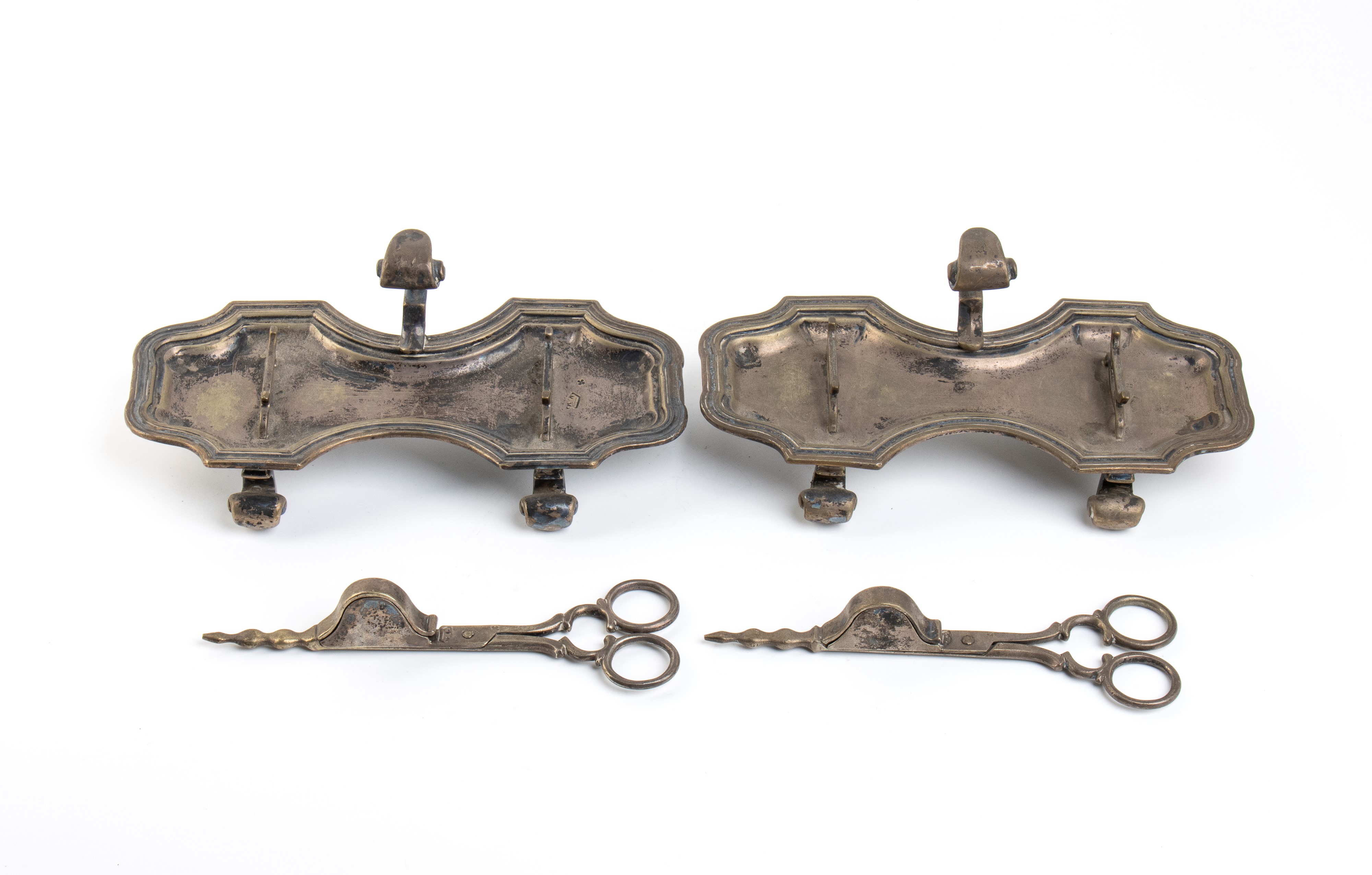 Coppia di spegni candela in argento