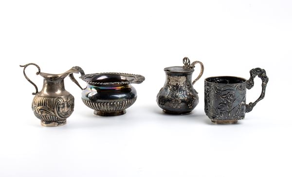 Lotto di 4 bricchi in argento