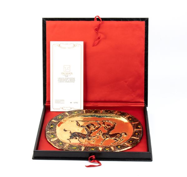 Piatto in argento dorato