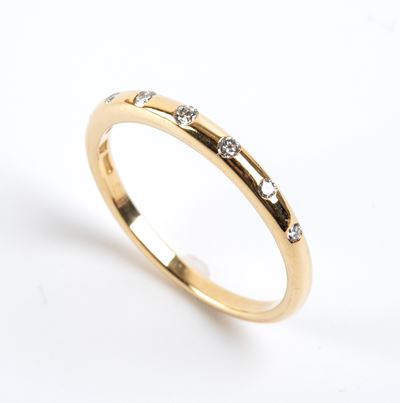 Fedina in oro giallo 18k con diamanti