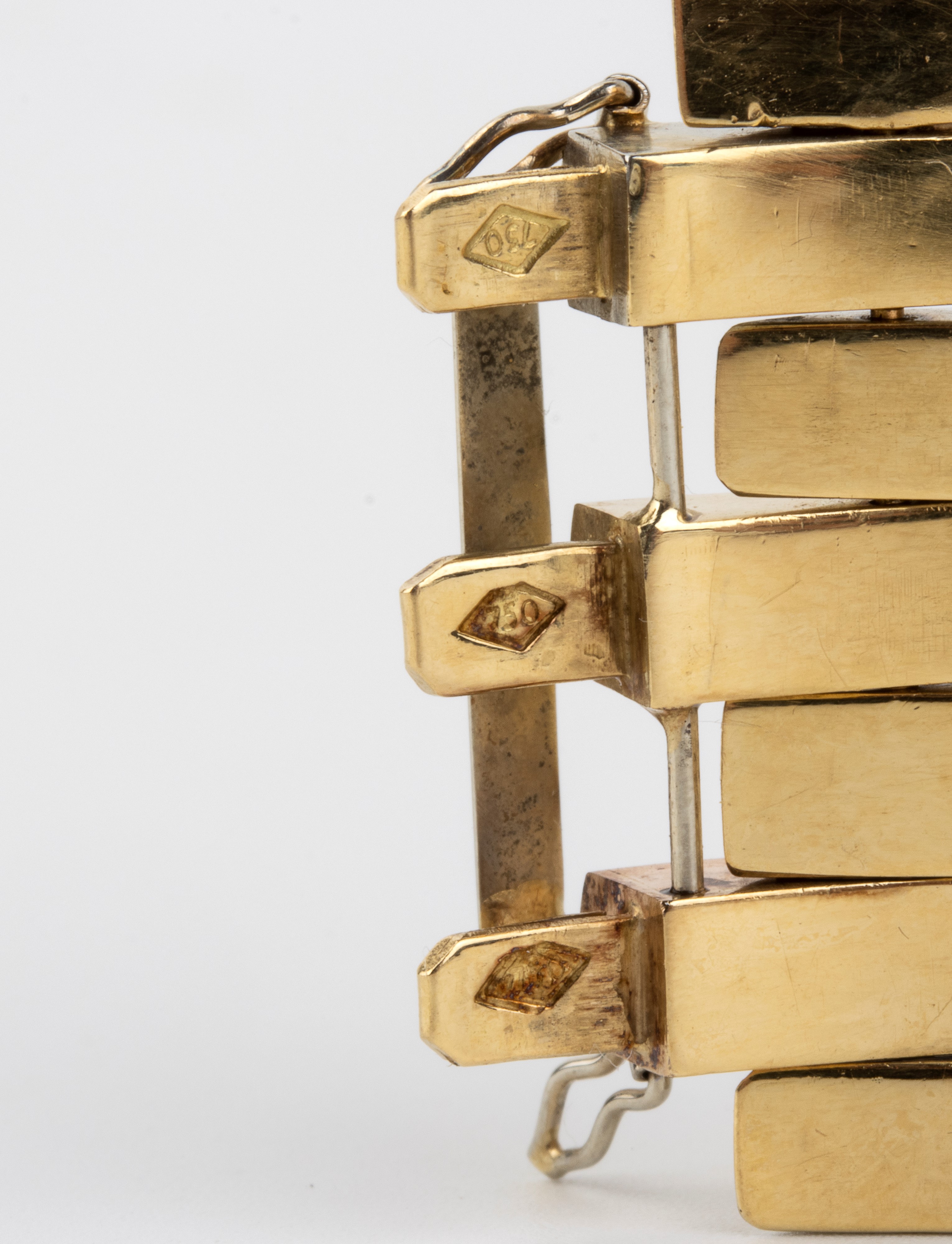Oro 18k, Bracciale a maglie carrarmato (tank) in tre colori