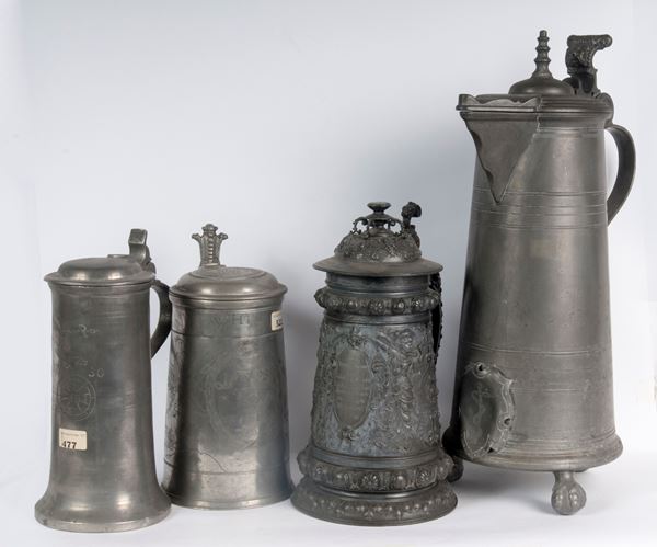 Lotto di quattro boccali da birra in peltro