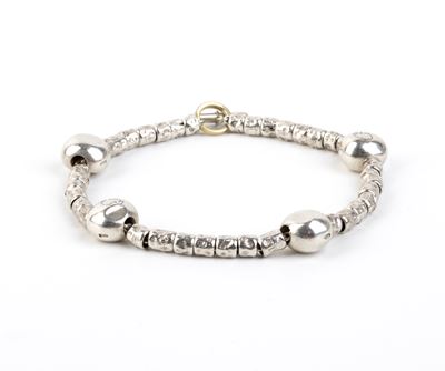 Collezione “Dodo”: bracciale in argento con chiusura ad anello in oro giallo