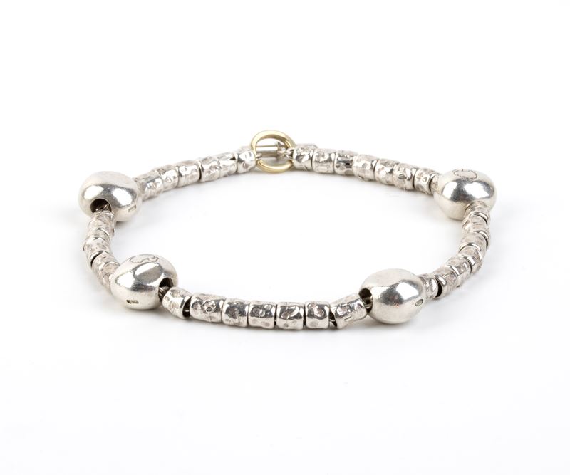 Pomellato - Collezione “Dodo”: bracciale in argento con chiusura ad anello in oro giallo