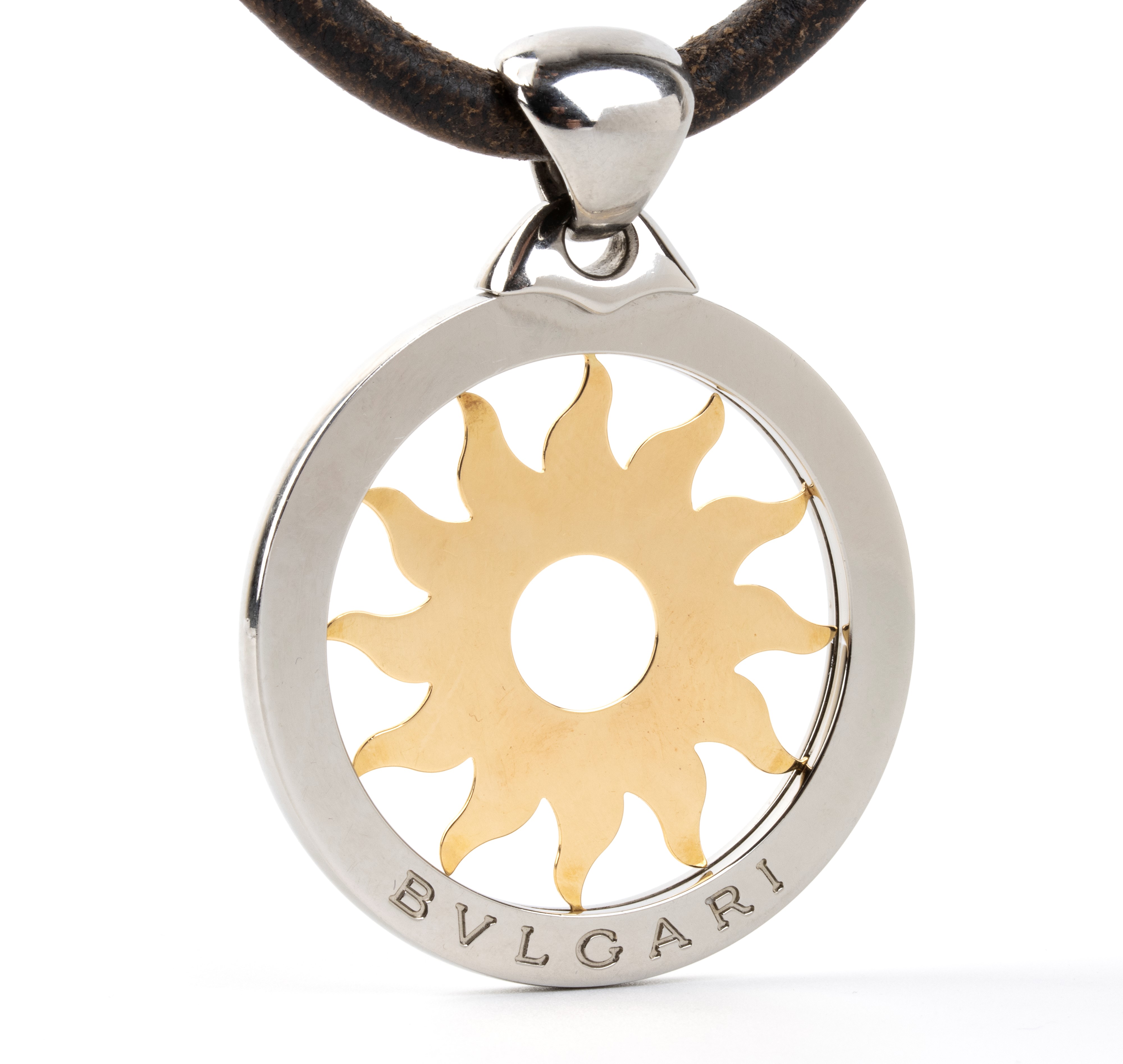 Bulgari - Girocollo con pendente in oro giallo 18k e acciaio raffigurante un sole