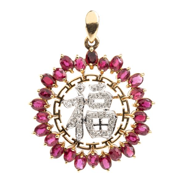 Pendente in oro con rubini e diamanti   