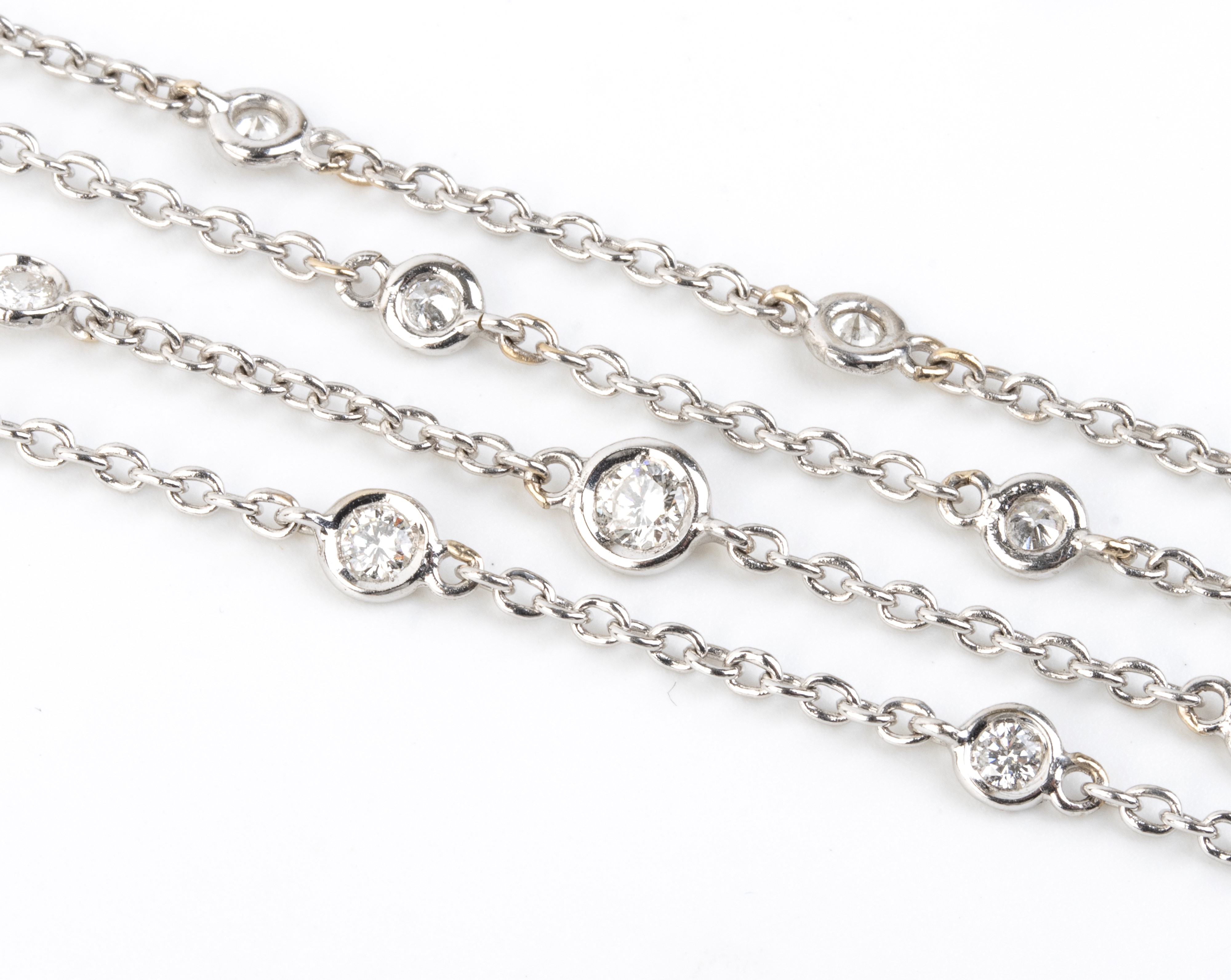 Asta con catene in oro bianco 18k e diamanti, set di tre catenine a maglia forzatina