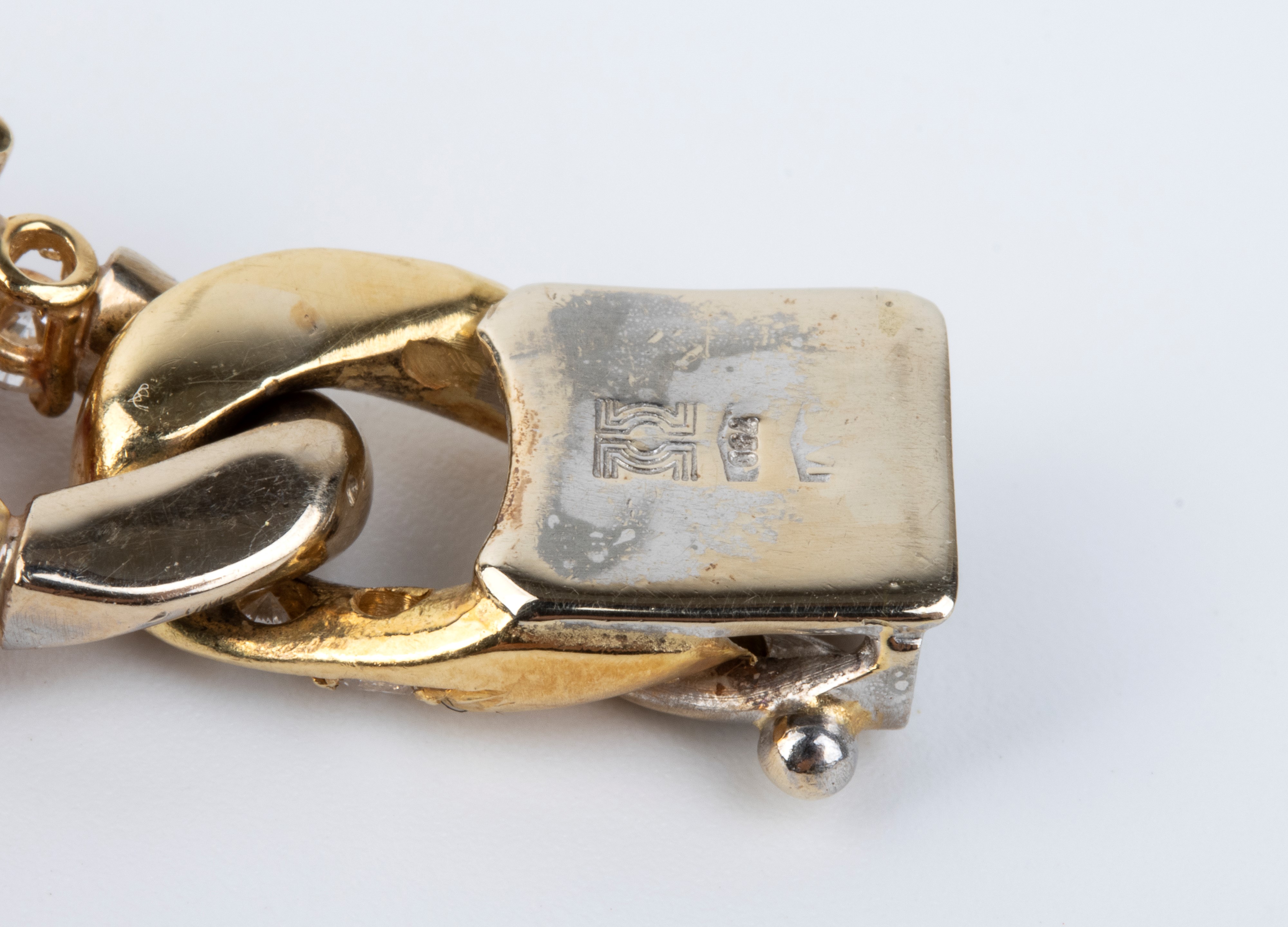 Bracciale in oro con rubini e diamanti