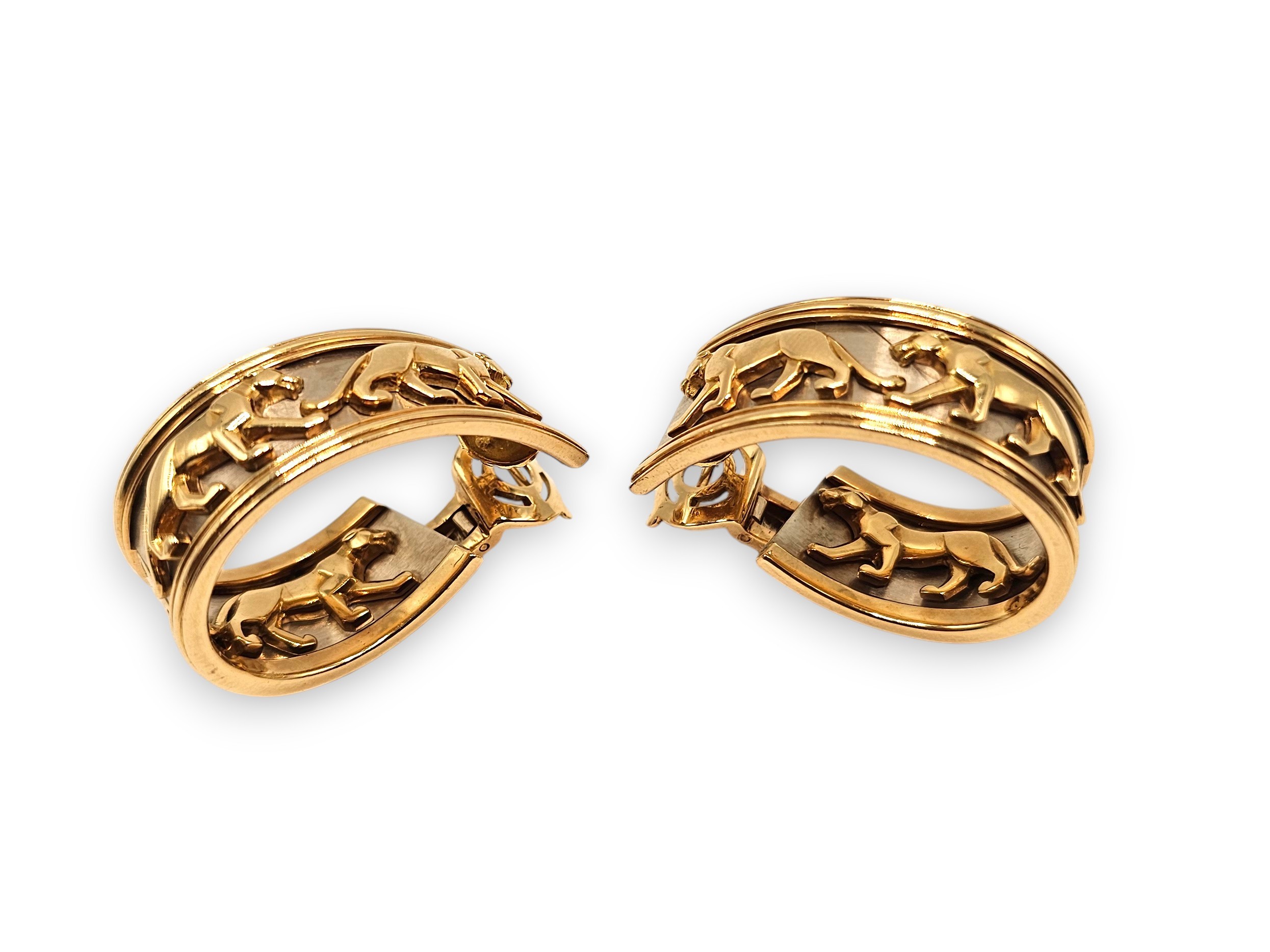Cartier - Collezione “Walking Panthère”: orecchini a nastro pendenti in oro 18k (oro giallo e oro...