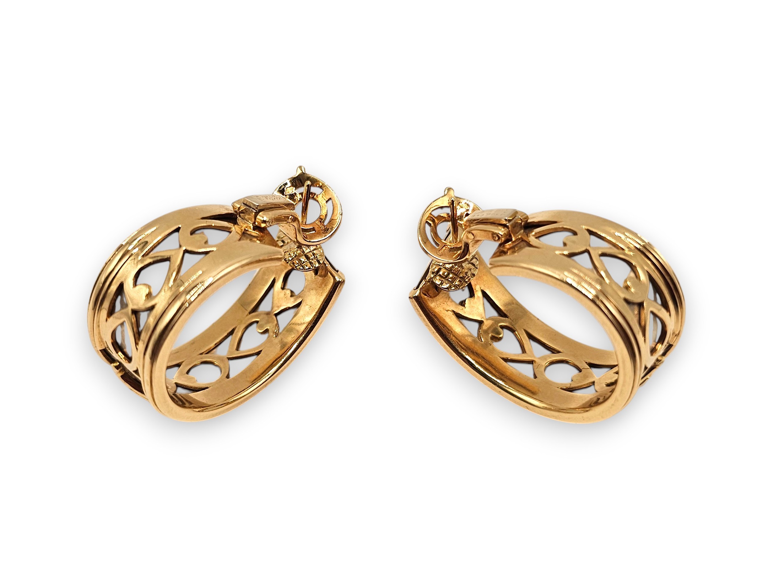 Cartier - Collezione “Walking Panthère”: orecchini a nastro pendenti in oro 18k (oro giallo e oro...
