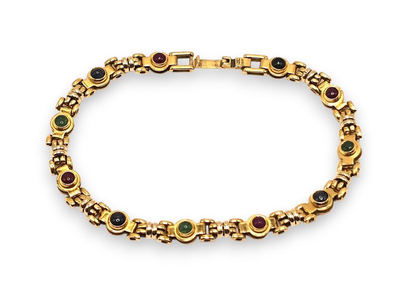 Bracciale in oro giallo 18k con zaffiri, rubini e smeraldi
