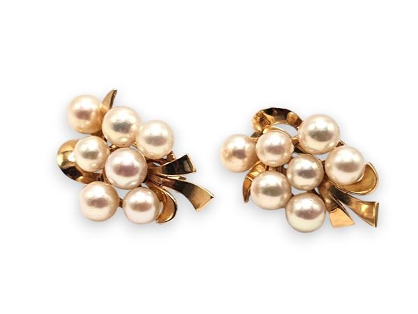 Paio di orecchini a clip con perle